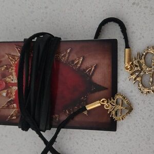 Virgins saint and angels leather heart necklace